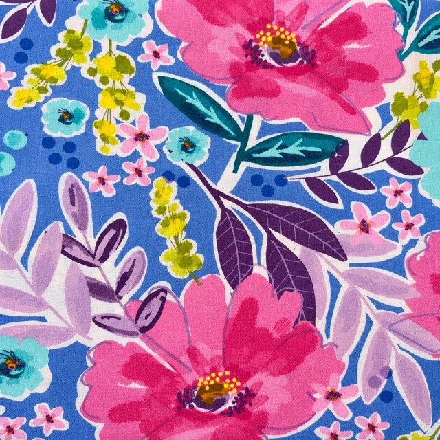 Oversized pink flowers, teal blossoms, and purple leaves on blue.