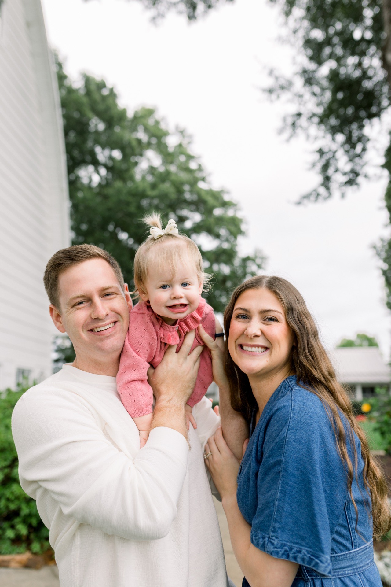 Kaity and Stevan with their daughter outdoors